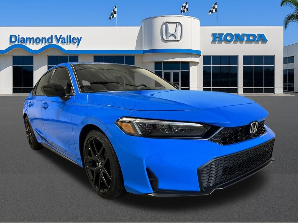 2026 Honda Civic Sport in Boost Blue Pearl — front three-quarter view