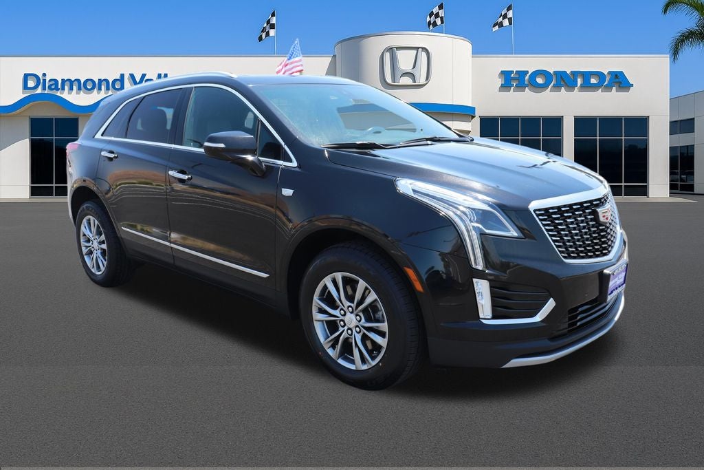 2023 Cadillac XT5 Premium Luxury in Stellar Black Metallic — front three-quarter view