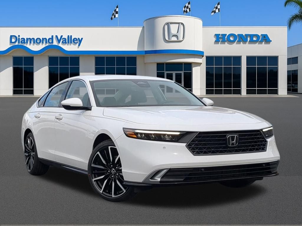 2026 Honda Accord Hybrid Touring in Platinum White Pearl — front three-quarter view