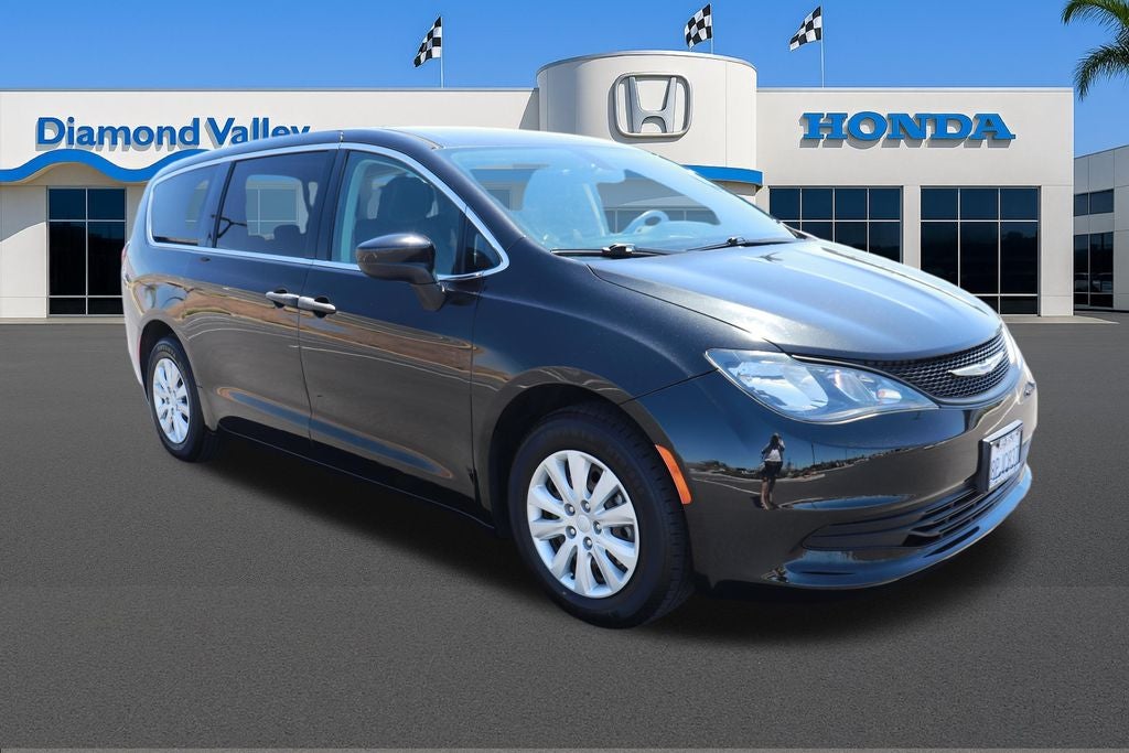 2020 Chrysler Voyager L in Brilliant Black Crystal Pearlcoat — front three-quarter view