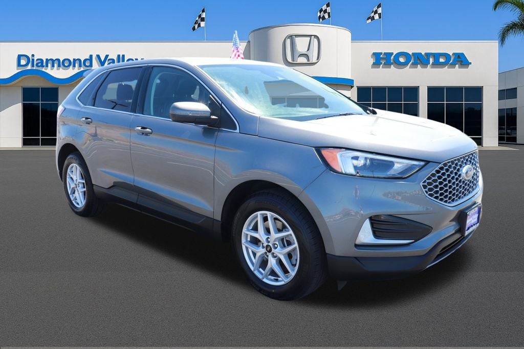 2024 Ford Edge SEL in Carbonized Gray Metallic — front three-quarter view