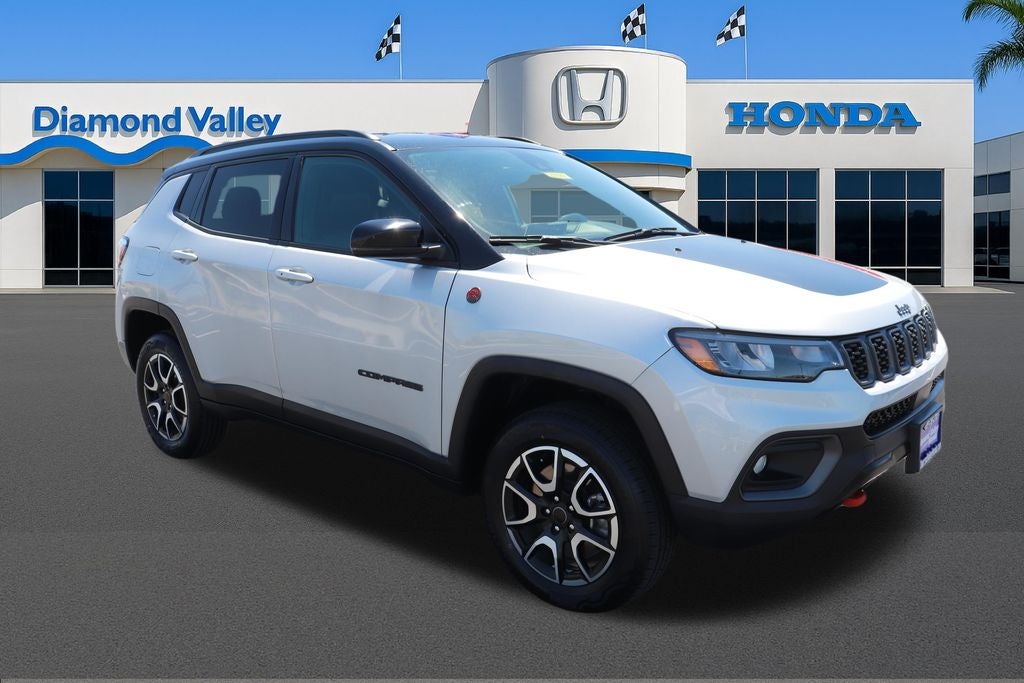 2025 Jeep Compass Trailhawk in Silver Zynith Metallic Clearcoat — front three-quarter view