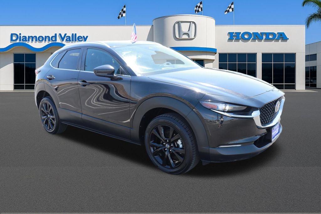 2024 Mazda Mazda CX-30 2.5 S Select Sport in Jet Black Mica — front three-quarter view
