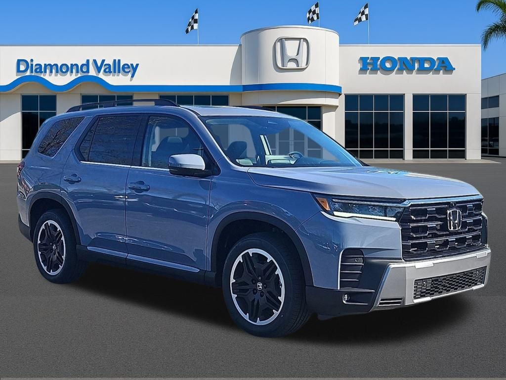 2026 Honda Pilot Touring in Sonic Grey Pearl — front three-quarter view
