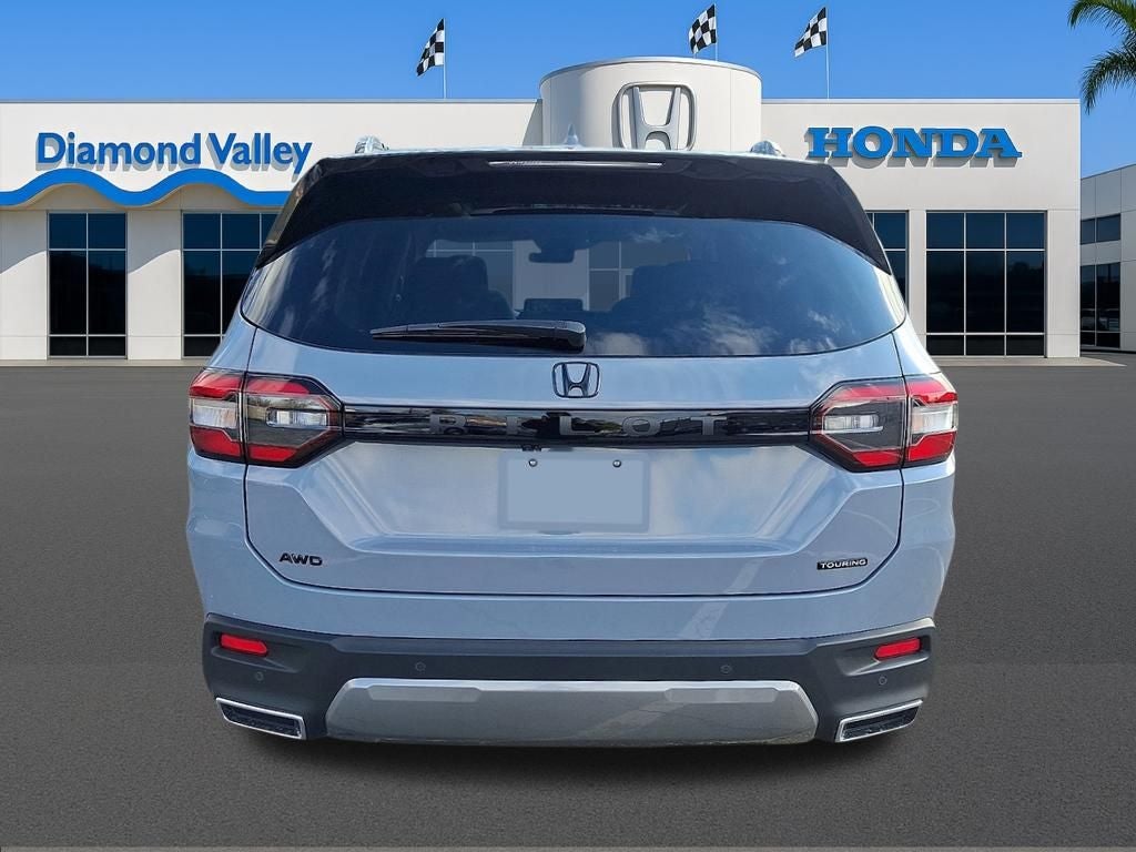 2026 Honda Pilot — rear three-quarter view