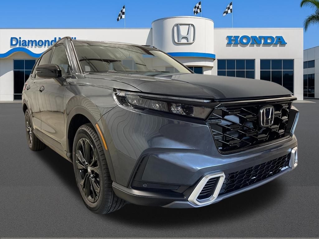 2026 Honda CR-V Hybrid Sport Touring in Meteorite Gray Metallic — front three-quarter view