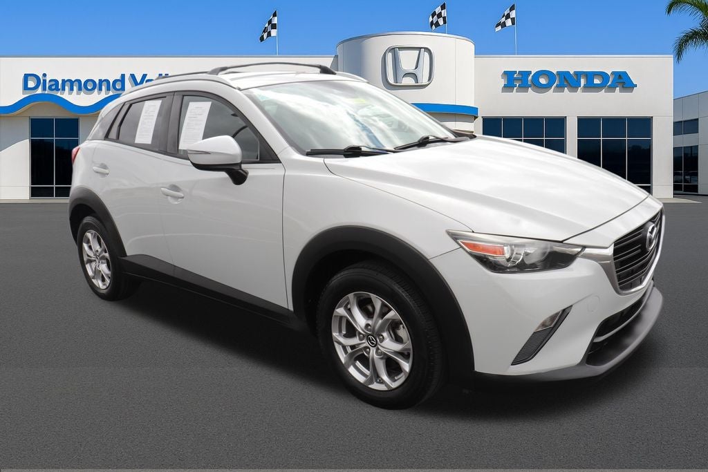 2019 Mazda Mazda CX-3 Sport in Ceramic Silver Metallic — front three-quarter view