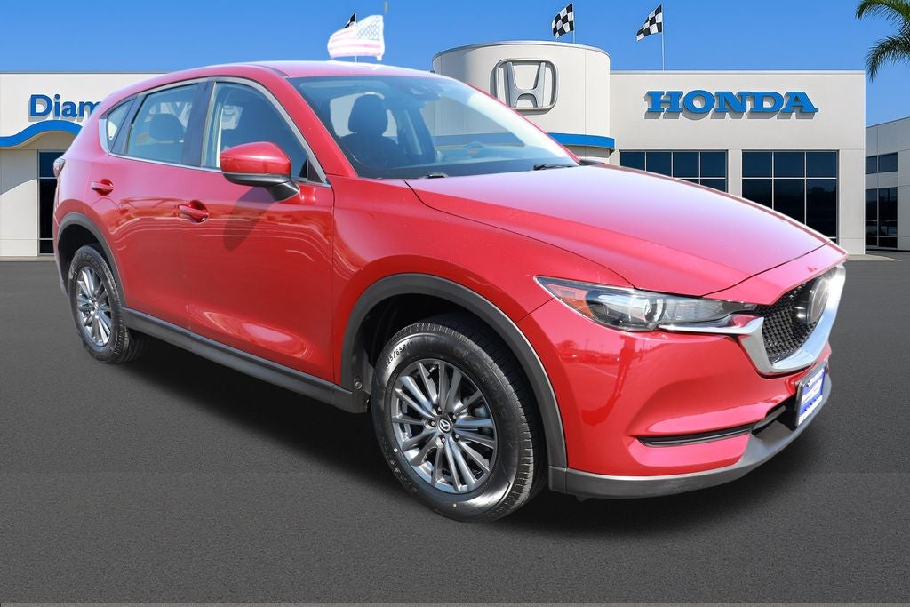 2020 Mazda Mazda CX-5 Sport in Soul Red Crystal Metallic — front three-quarter view