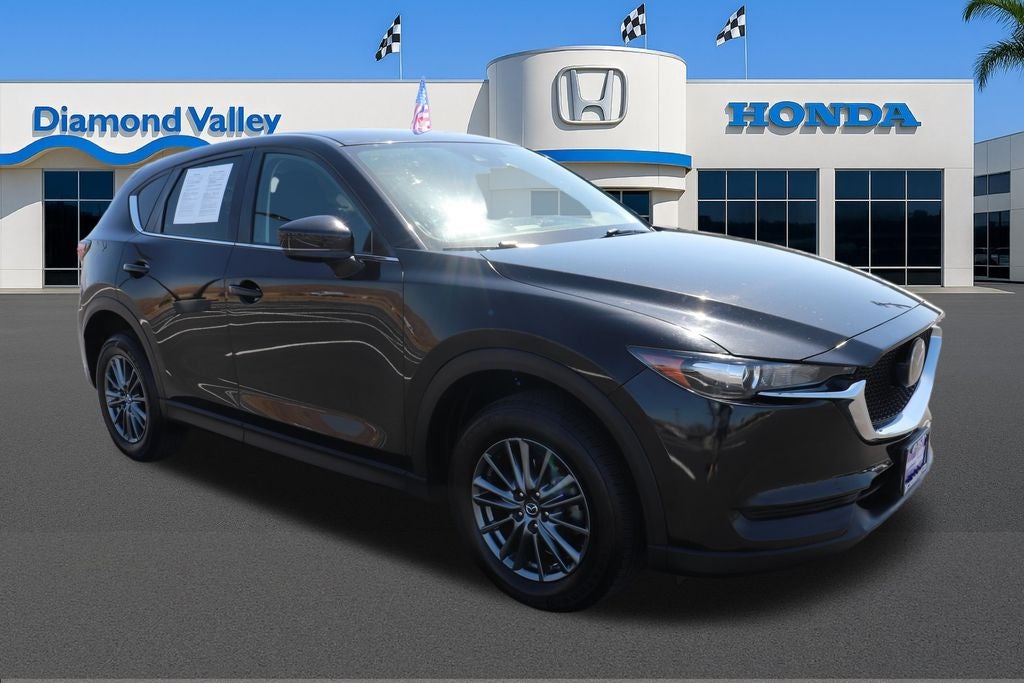 2020 Mazda Mazda CX-5 Sport in Jet Black Mica — front three-quarter view