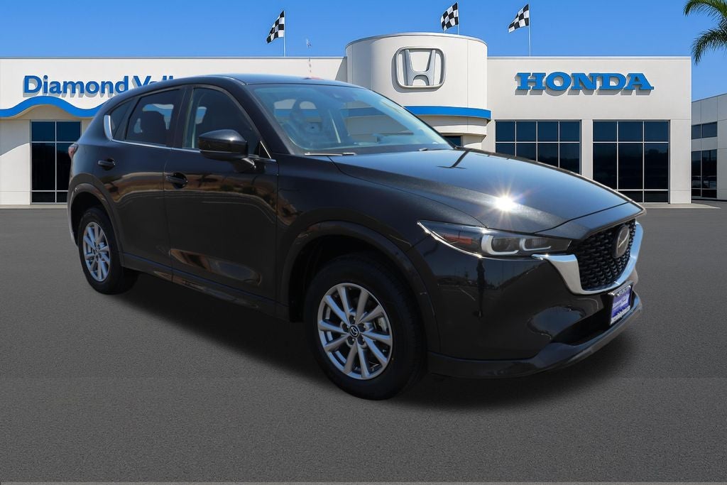 2024 Mazda Mazda CX-5 2.5 S Select Package in Jet Black Mica — front three-quarter view