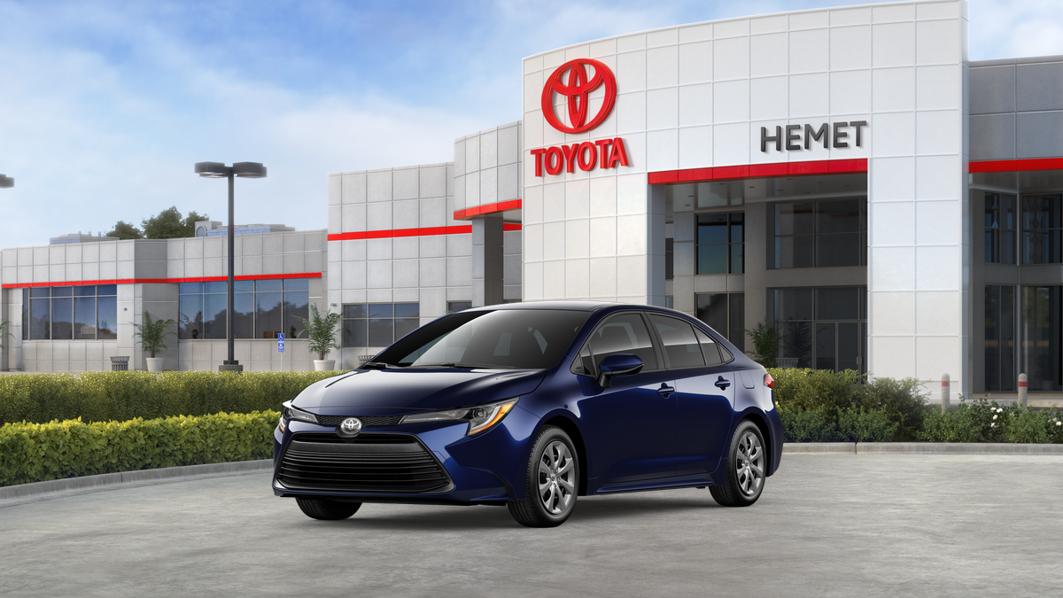 2026 Toyota Corolla LE in Blueprint — front three-quarter view