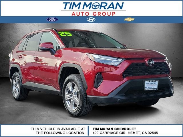 2025 Toyota RAV4 XLE in Ruby Flare Pearl — front three-quarter view