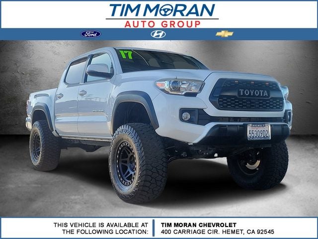 2017 Toyota Tacoma TRD Off-Road V6 in Super White — front three-quarter view
