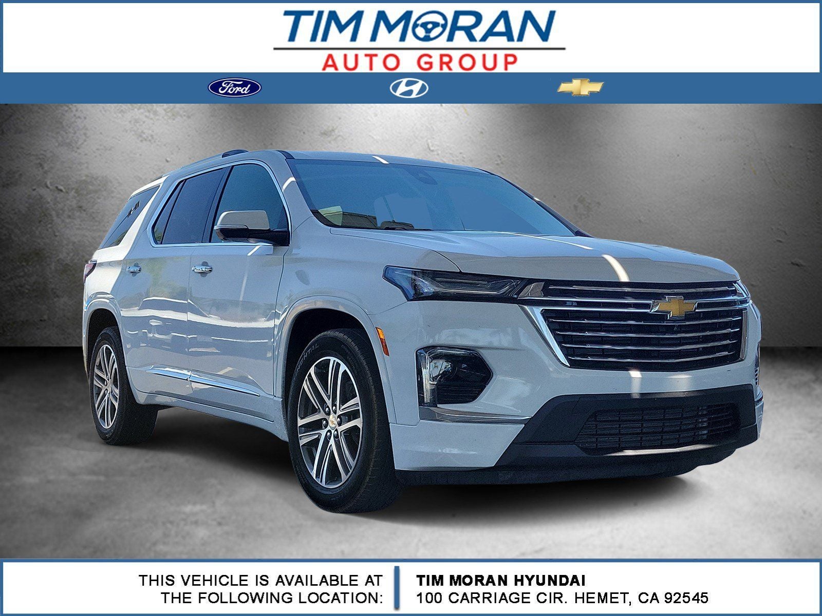 2023 Chevrolet Traverse High Country in Summit White — front three-quarter view