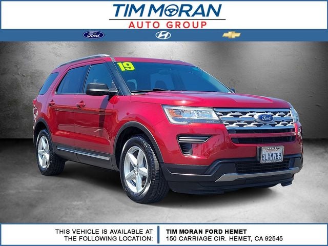 2019 Ford Explorer XLT in Ruby Red Metallic Tinted Clearcoat — front three-quarter view