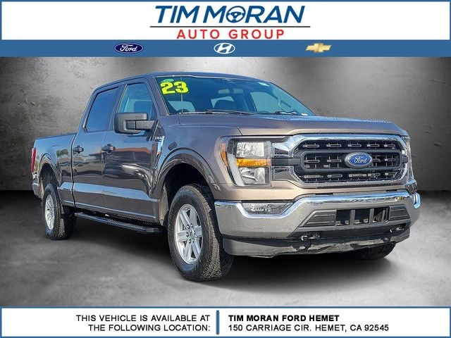 2023 Ford F-150 XLT in Stone Gray Metallic — front three-quarter view