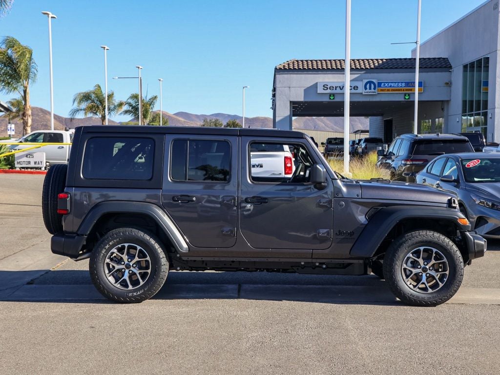 2026 Jeep Wrangler — rear three-quarter view