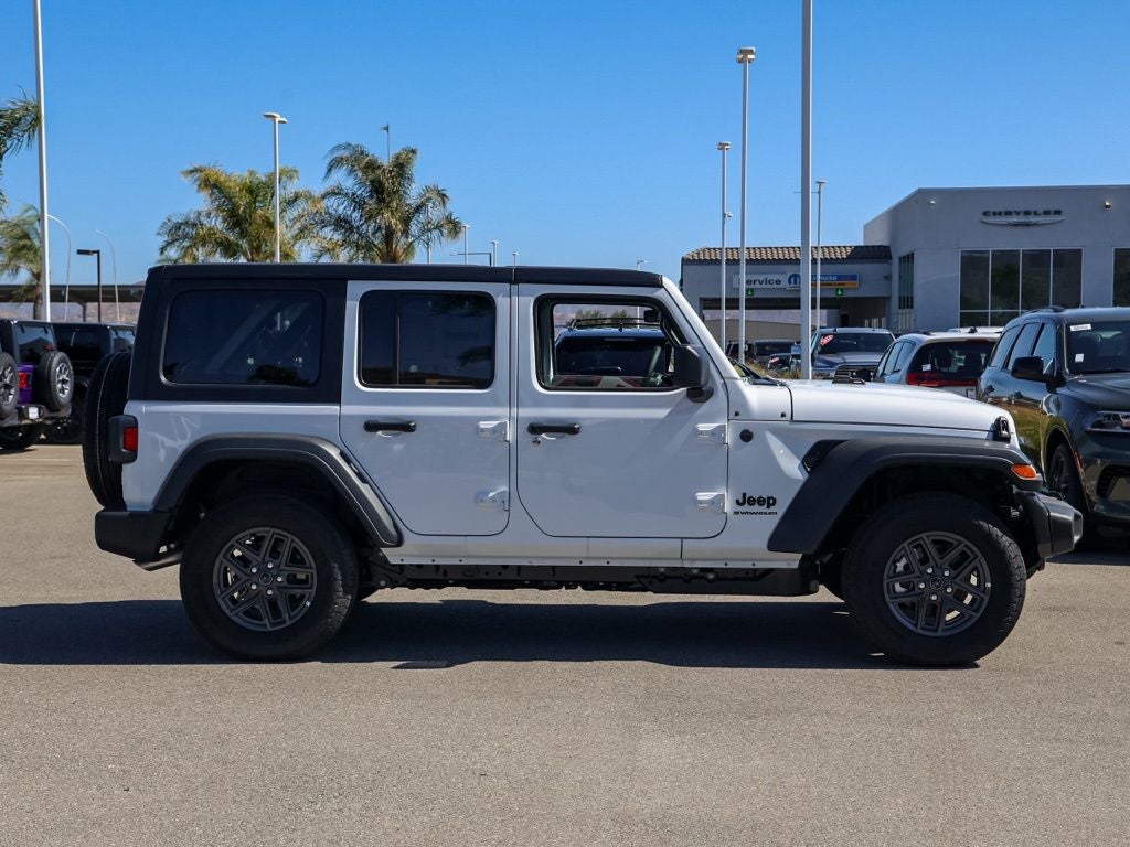 2026 Jeep Wrangler — rear three-quarter view