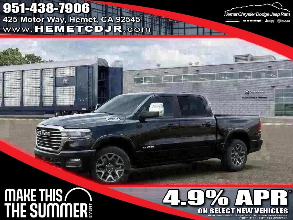 2026 RAM 1500 Laramie in Diamond Black Crystal Pearlcoat — front three-quarter view