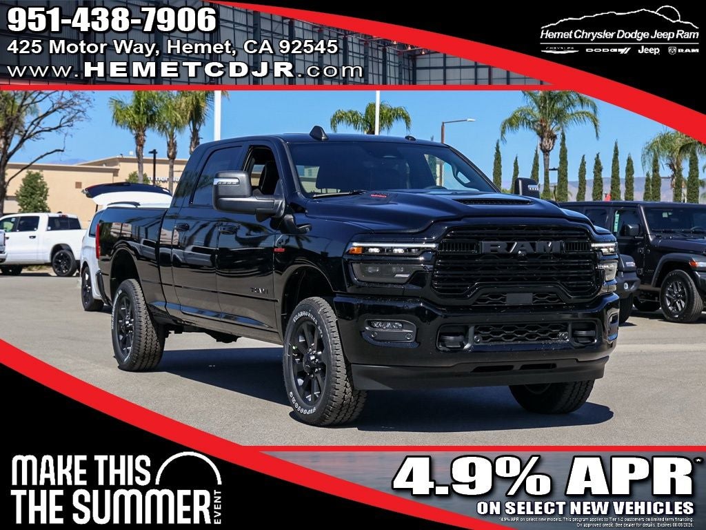 2026 RAM 2500 Laramie Night Edition Mega Cab in Diamond Black Crystal Pearlcoat — front three-quarter view